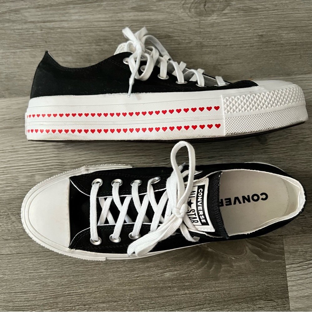 Converse All Star Chuck Taylors Black with hearts on white platforms